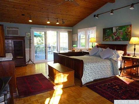 Through the sliding door and out to the deck.