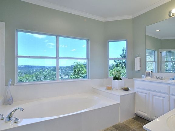 Master Bathroom with a View! Oversized shower and garden tub. Double vanities.