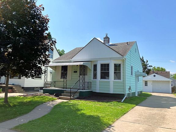 New windows, new steel side door. Garage has electricity & remote opener.