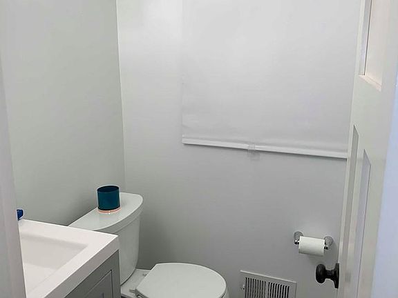 Main level half bathroom.