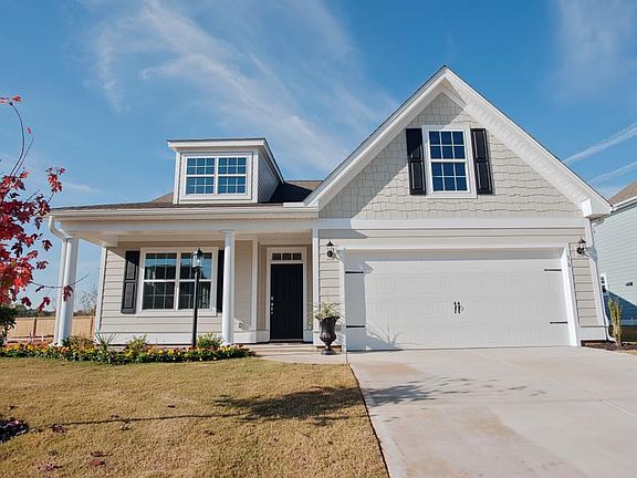 Photos are of a similar home