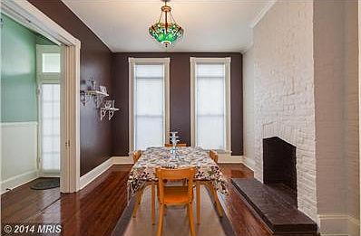 Dining Room w/ Decorative Fireplace