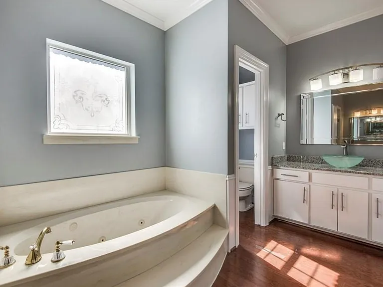 Master Bath with separate vanities and shower