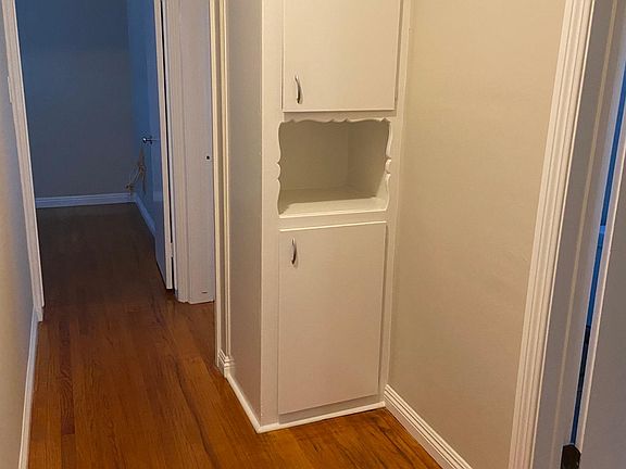 Hallway to bathroom and bedrooms