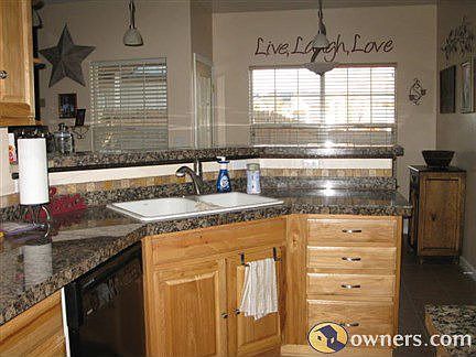 Kitchen with Granite Counter Tops over looking Breakfast Nook