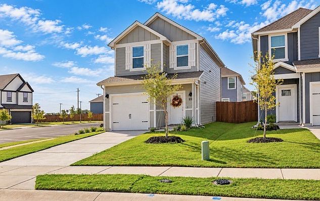 Beautiful two-story home with inviting curb appeal and an attached garage!