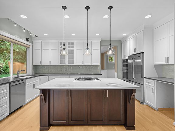 Elegant chef's kitchen featuring high-end appliances