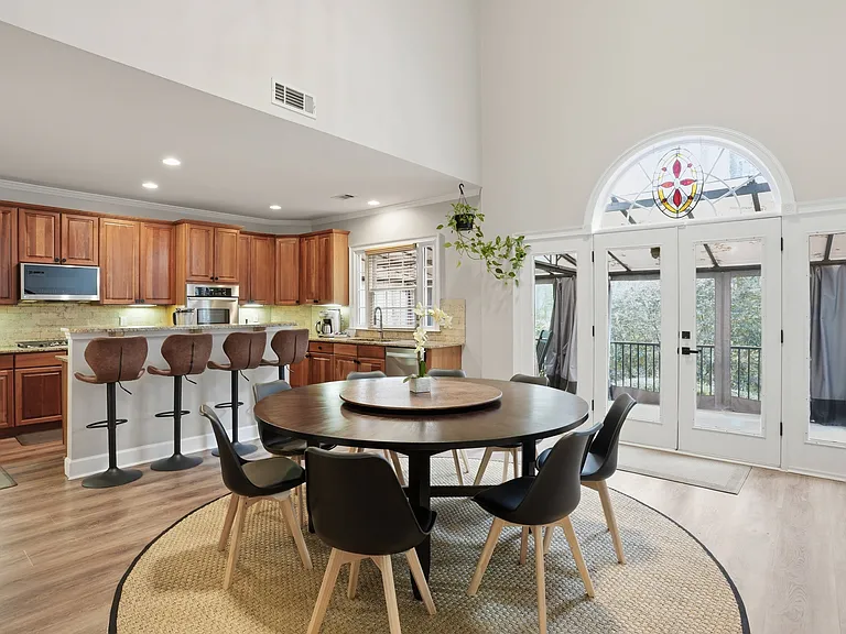 Kitchen and dining area with direct access to outdoor space