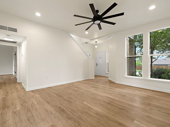Living room and entry to the master suite that's located downstairs