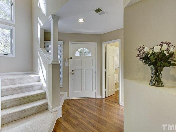 Spacious foyer, half bath, stairs leading to second floor