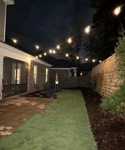 Cozy fenced backyard with patio right off screened in porch