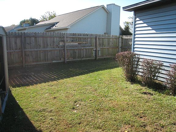 Fenced back yard.