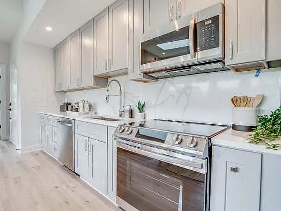 Kitchen with luxury stone countertops.