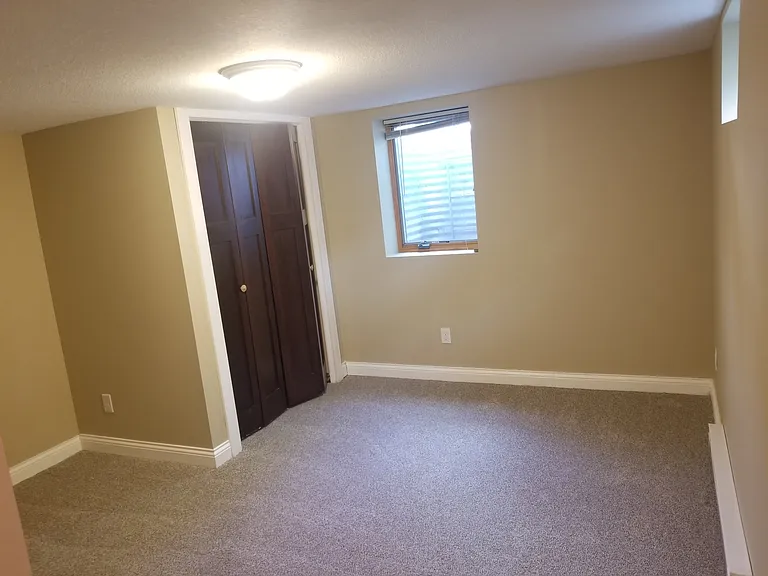 Bedroom has egress window and another window for lots of light and ventilation.