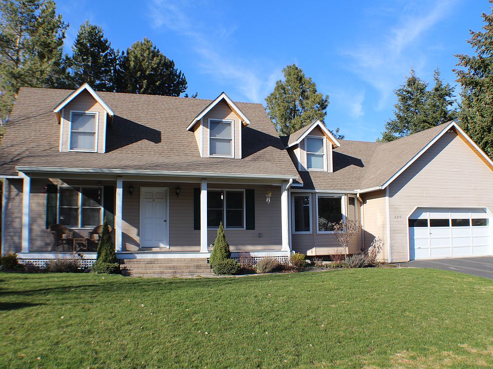 1st image of 880 SE Edge Knoll Dr