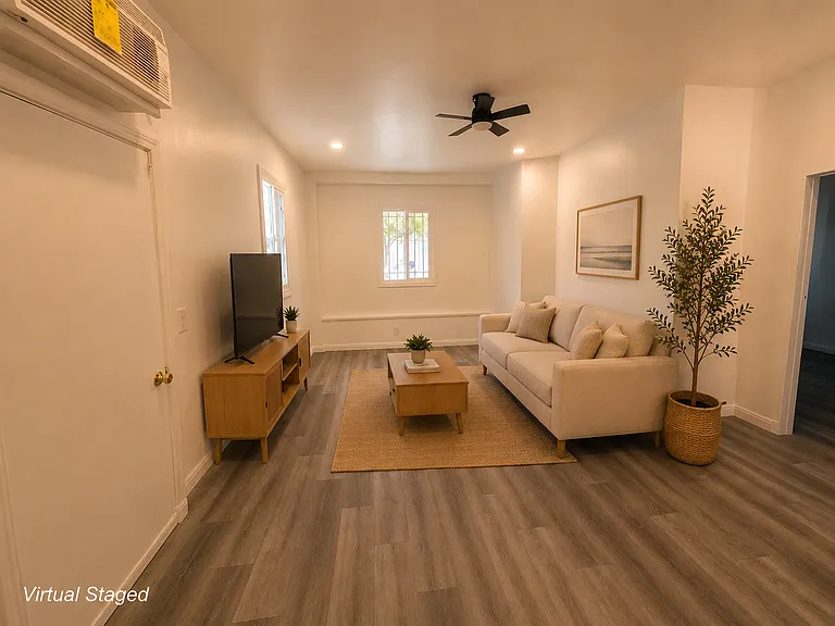 Large Living room with Wall AC/heater.
Virtually Staged