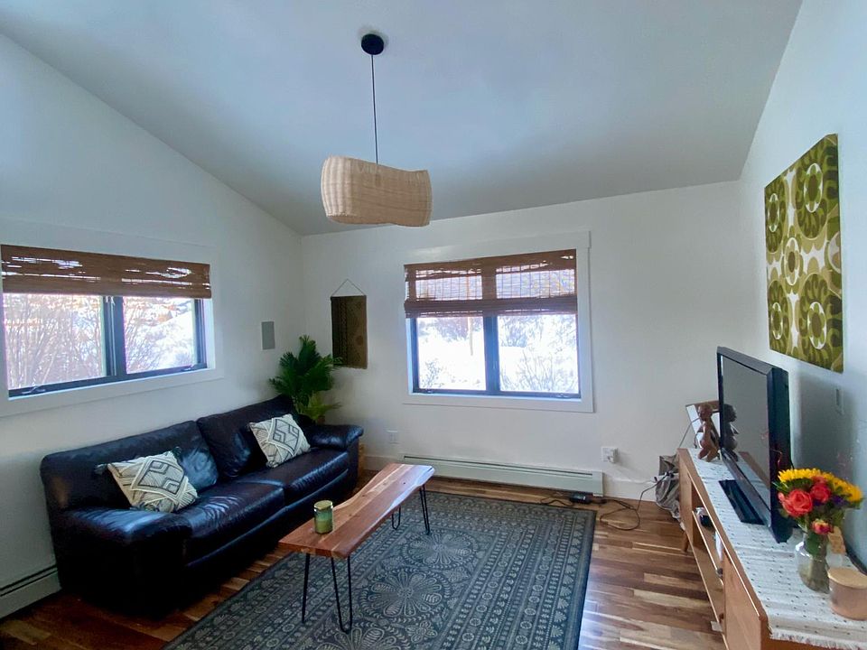 Living area with vaulted ceilings