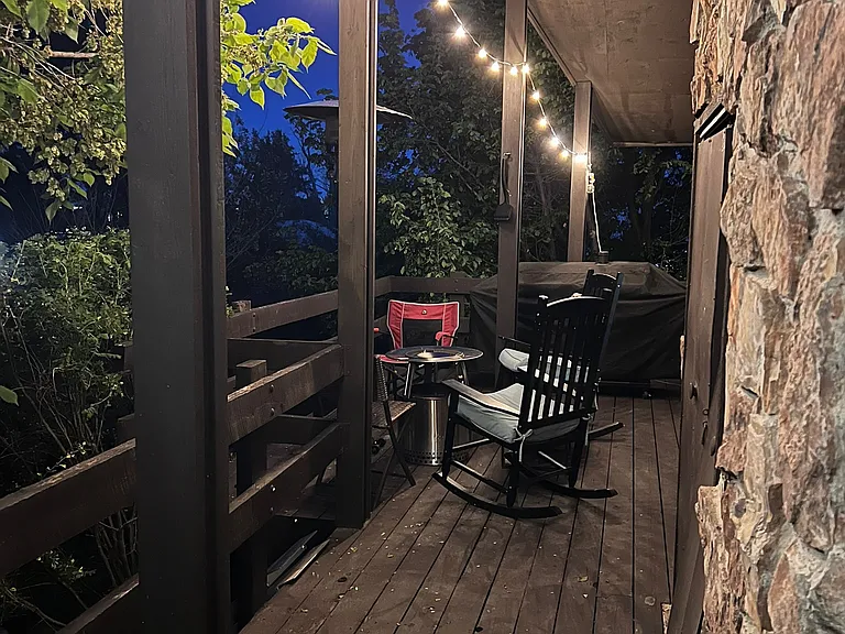 Side wooden deck off of dining room