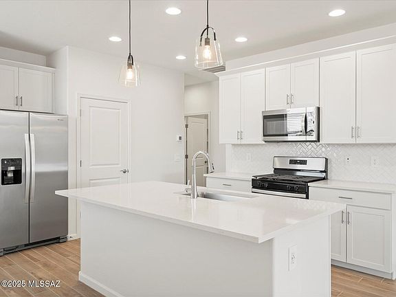 5th image of 9870 N Solstice Ave