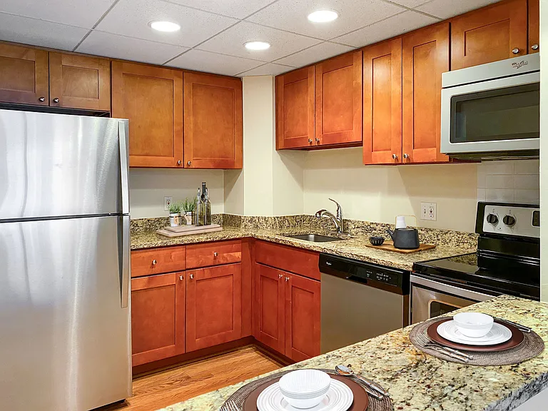 Kitchen with granite countertops and stainless steel appliances