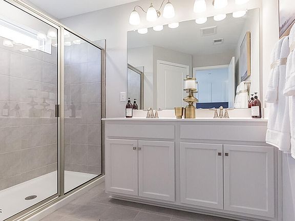 Luxurious bath - en suite with primary bedroom that backs to wooded view