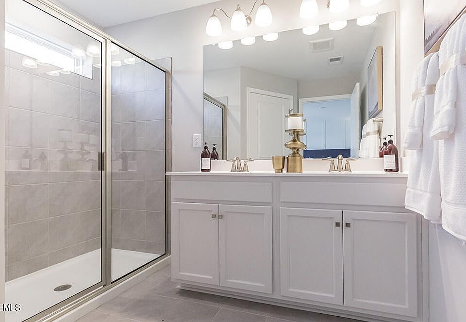 Luxurious bath - en suite with primary bedroom that backs to wooded view