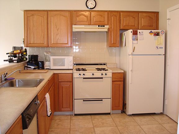 Updated cabinets, counters & floor.