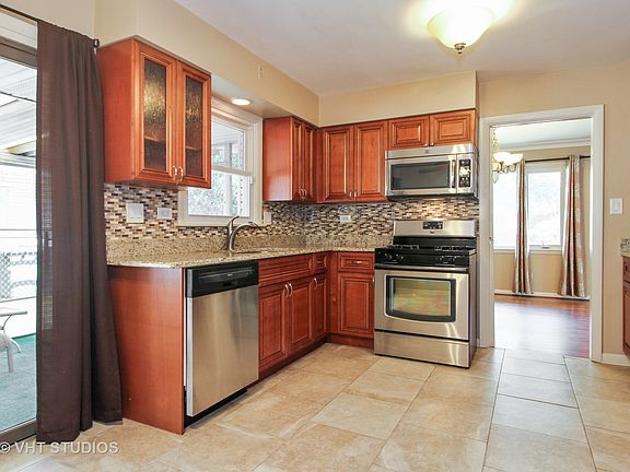 4th image of 9736 S Kolmar Ave