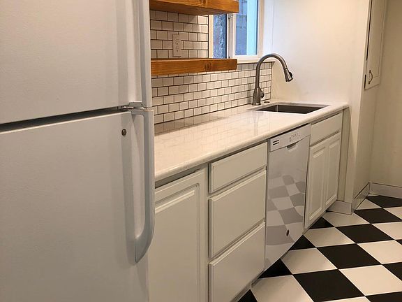 Full kitchen includes dishwasher, microwave and pantry