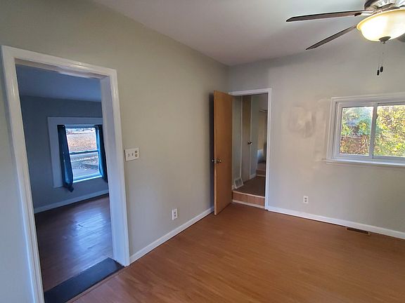 Living Room #1, Kitchen entry, and Bathroom entry