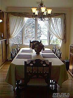 Dining room off kitchen features open floor plan