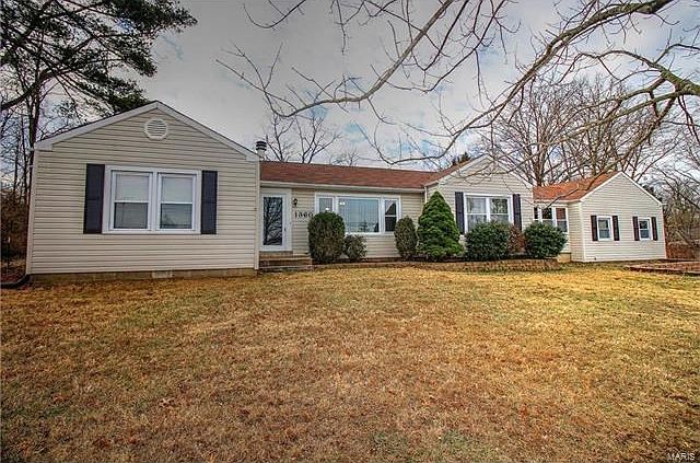 Spacious 2,269 sq ft home with a new roof sits on 1.88 acres.