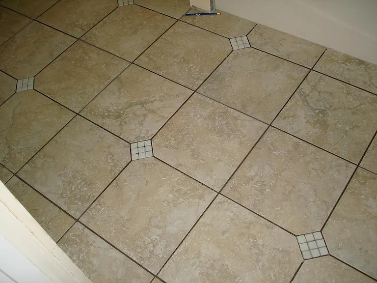 Porcelain and glass mosaic tiled floor