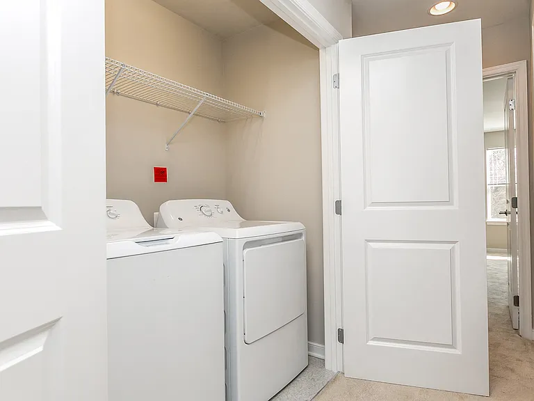 The convenience of a washer & dryer in your three-level townhome