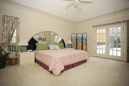 Master Bedroom w/ French Doors to Pool
