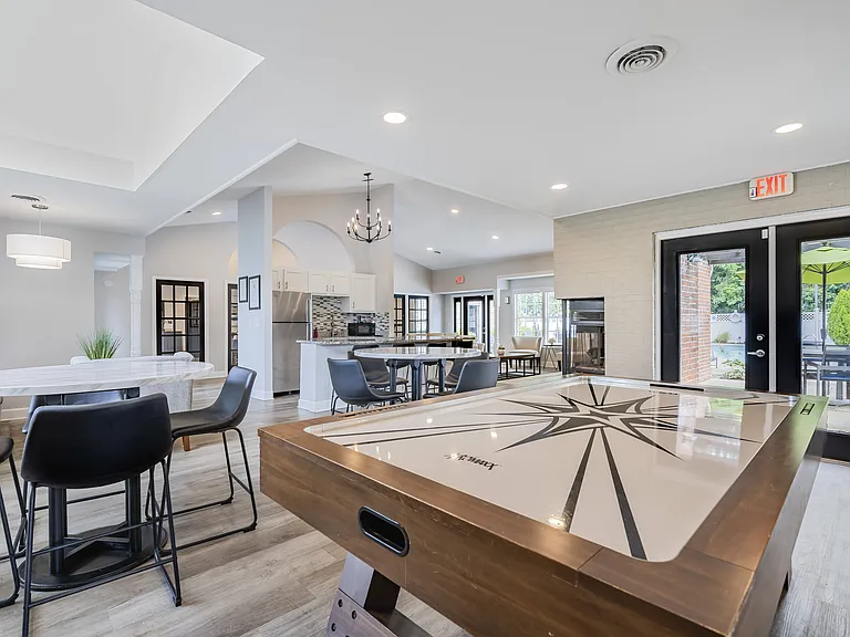 Meet neighbors and friends in the game room.