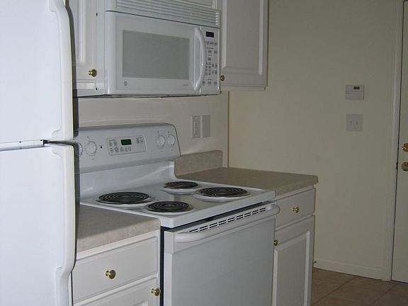 Door in back of Kitchen leads to Garage