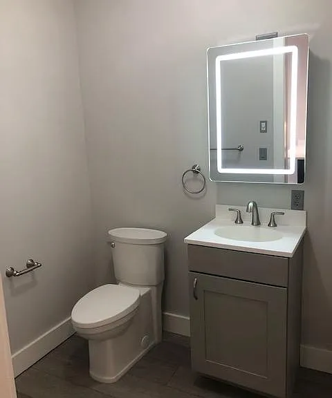 Entry bathroom with laundry hookup