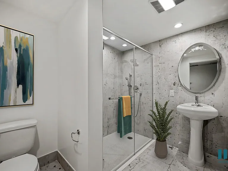 Large-Size Bathroom with Walk-In Shower with Glass Door - Two-Bedroom Two-Bathroom - Unit 108