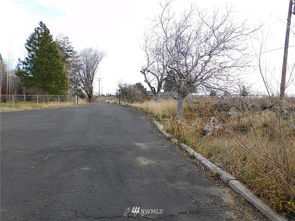 Asphalt driveway with gate