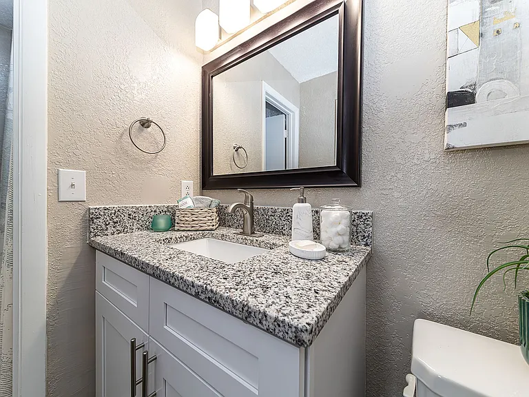 Bright bathroom with granite counters