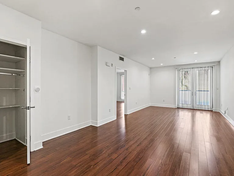 Living Room with a Storage Closet and Patio