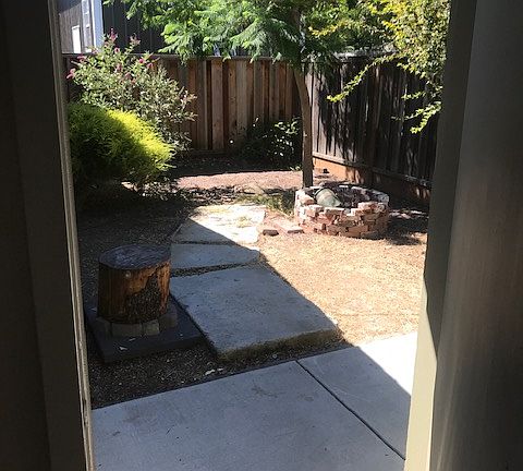 Fenced yard seen from front door