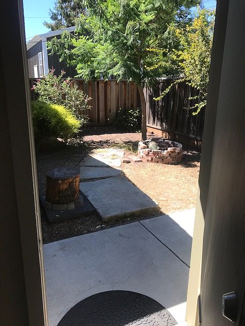 Fenced yard seen from front door