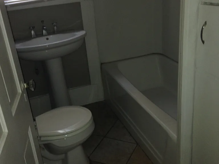 Bathroom has built in cabinet storage as well.