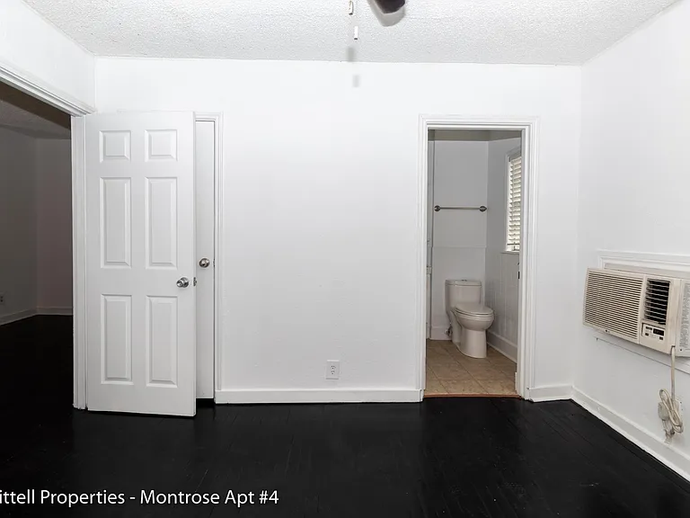 Bathroom is connected to the bedroom, walk in closet is to the left of the bedroom entrance
