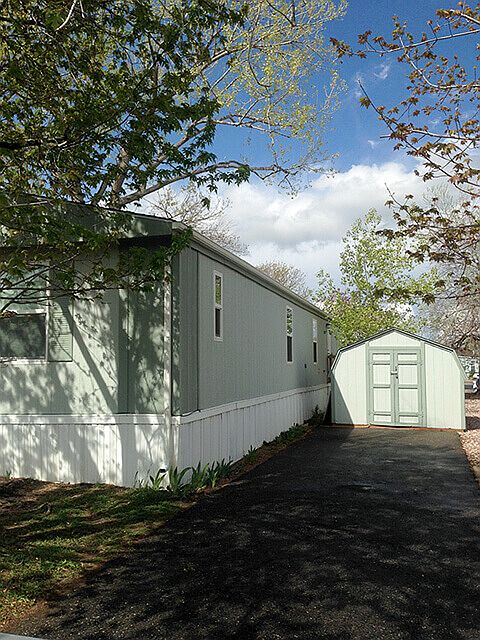 Front 2 car driveway + shed