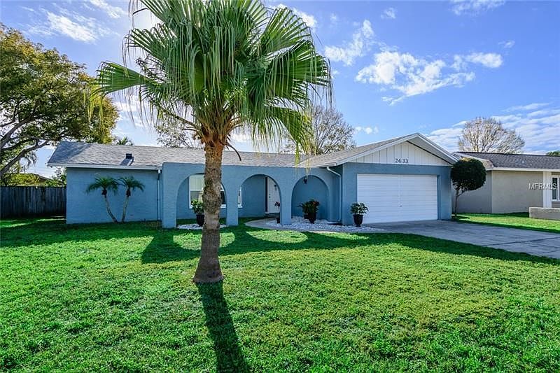 Welcome Home to 2433 Timbercrest Circle East in Woodgate of Countryside!