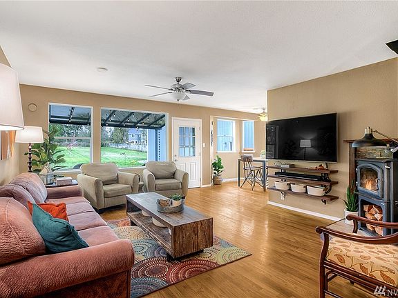 Spacious great room with cozy wood stove for those chilly nights.