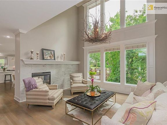 Cathedral Ceiling Formal Living Room - Marble Fireplace, New Hardwood Floors